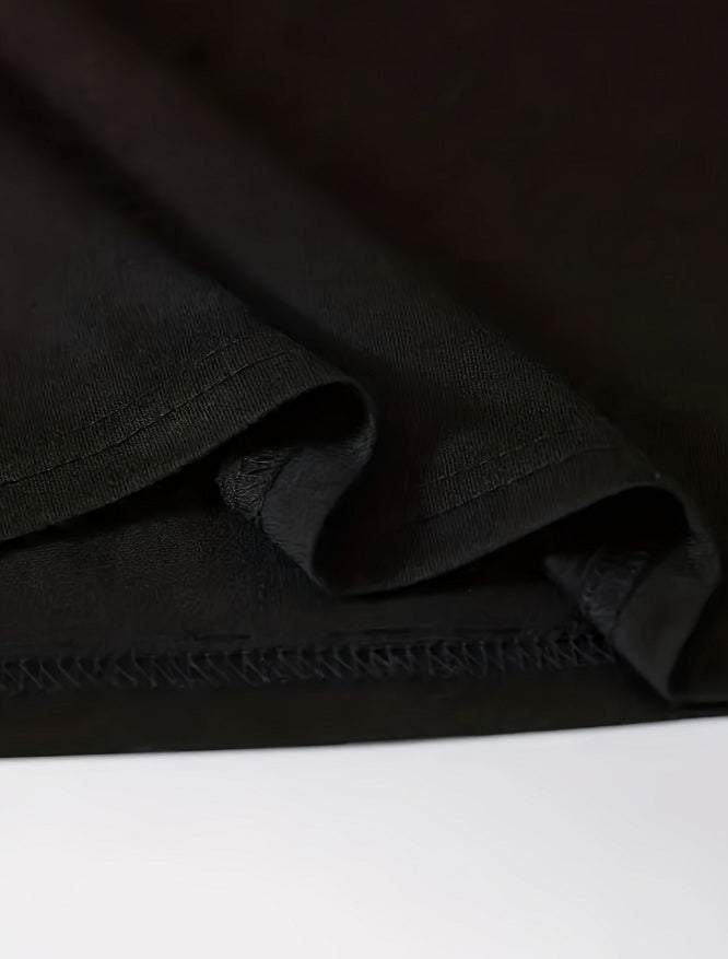 Black men's short sleeve T-shirt fabric detail.